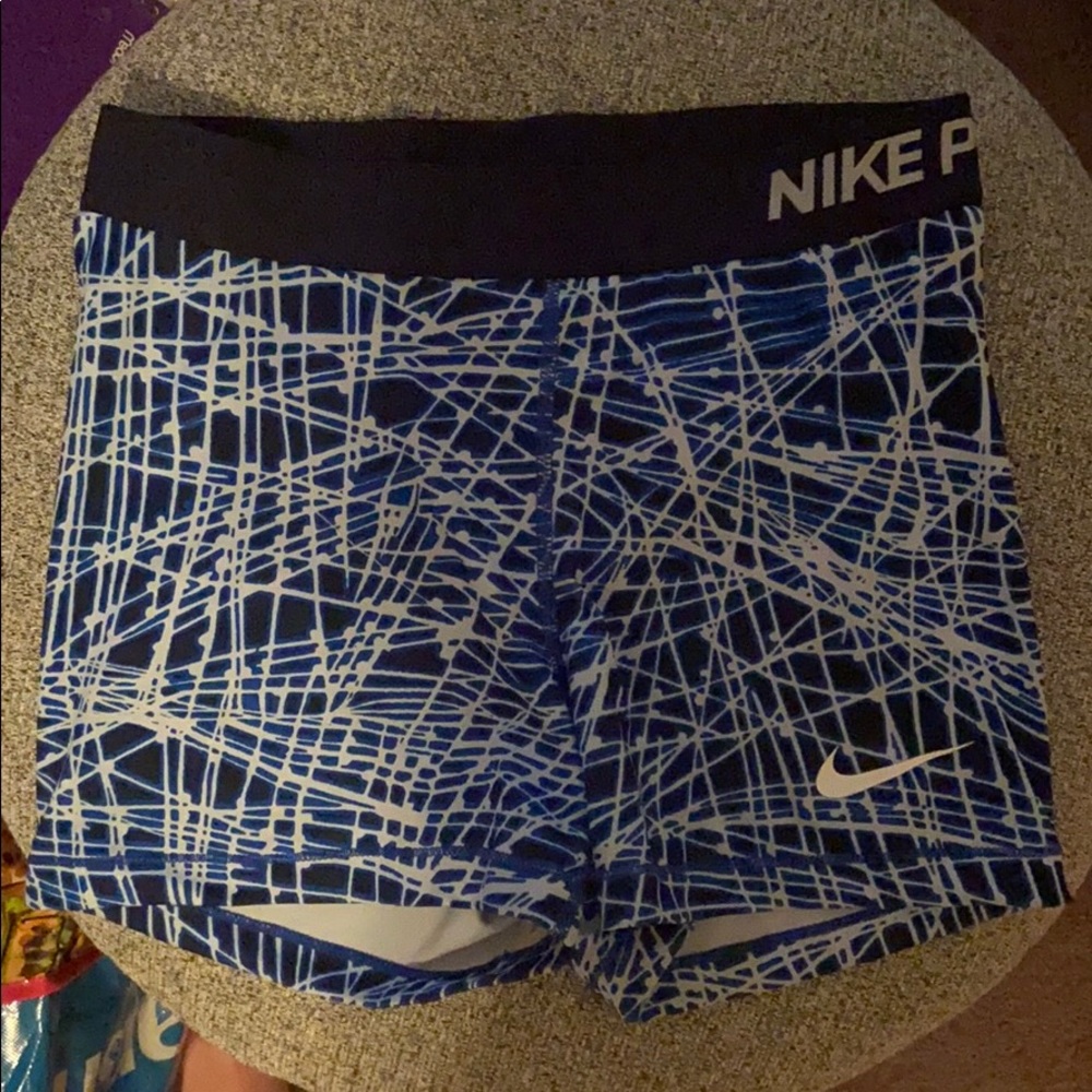 Blue patterned Nike pro shorts